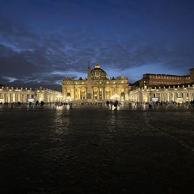 Nighttime view of St. Peter’s Basilica in Rome, Italy